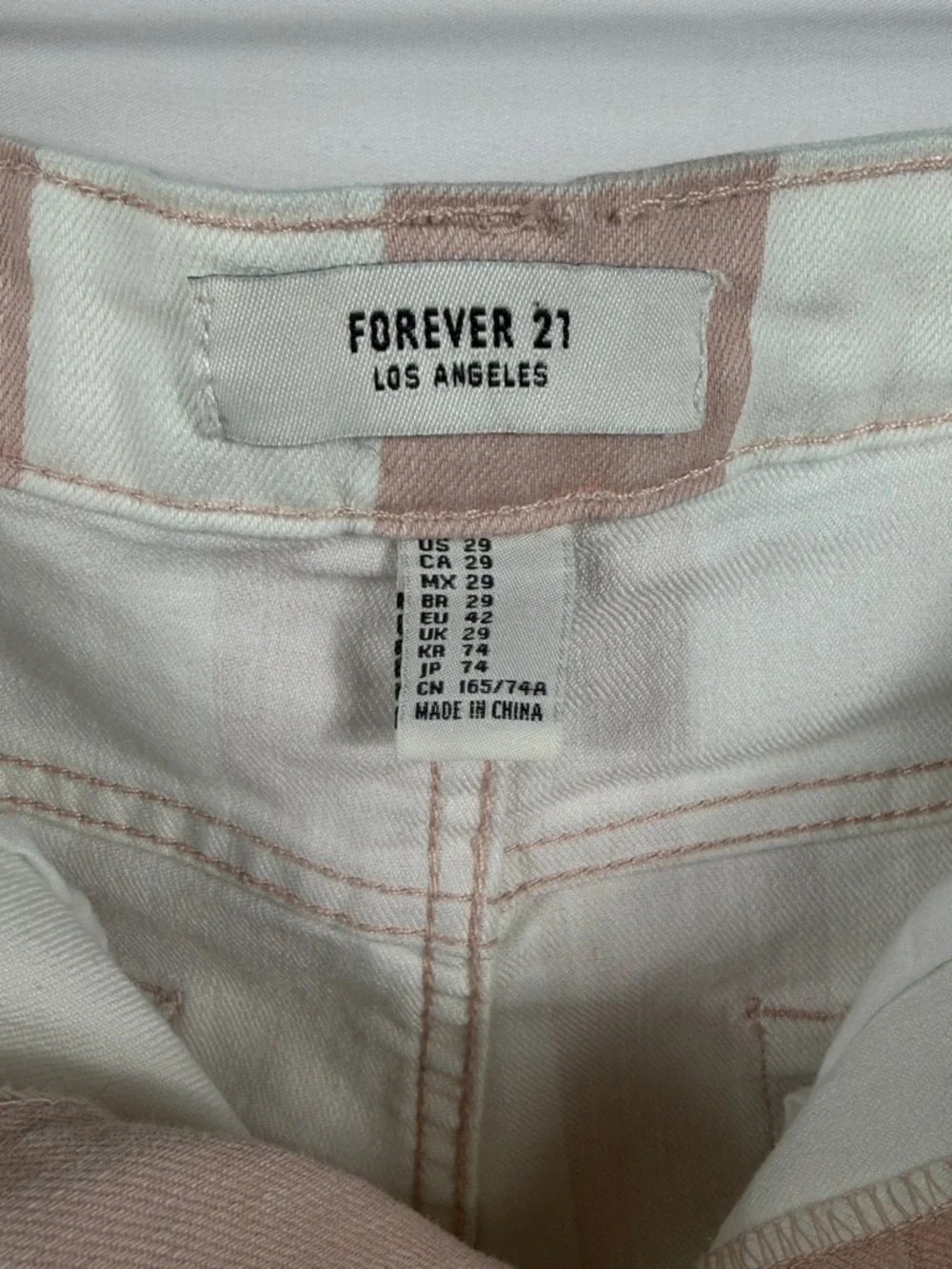 Forever 21 Blush Pink and White Striped Jean Shorts. Womens Size 29. Inseam 2.5”